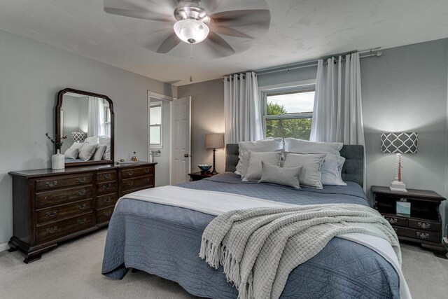 1801 N Mc Intosh Dr, Appleton, WI 54914 - bedroom with light carpet and ceiling fan
