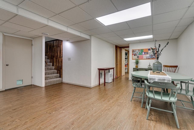 1801 N Mc Intosh Dr, Appleton, WI 54914 - dining space with light wood finished floors, stairway, and a paneled ceiling