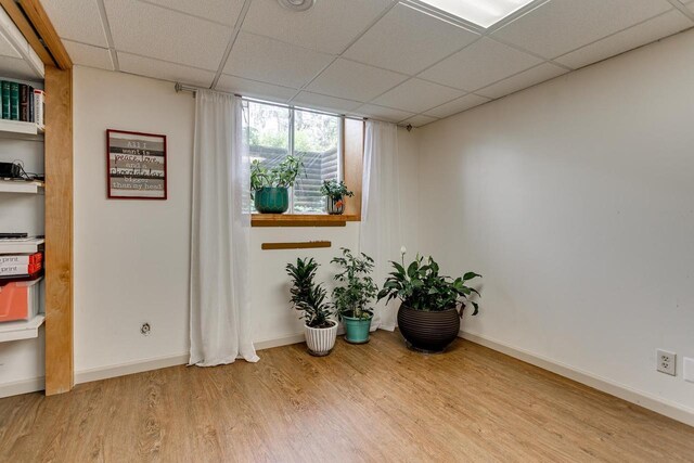 1801 N Mc Intosh Dr, Appleton, WI 54914 - miscellaneous room with wood finished floors and a drop ceiling