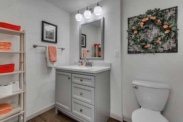 1801 N Mc Intosh Dr, Appleton, WI 54914 - half bathroom with vanity and wood finished floors