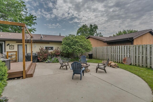 1801 N Mc Intosh Dr, Appleton, WI 54914 - view of patio / terrace featuring a deck, area for grilling, and an outdoor fire pit