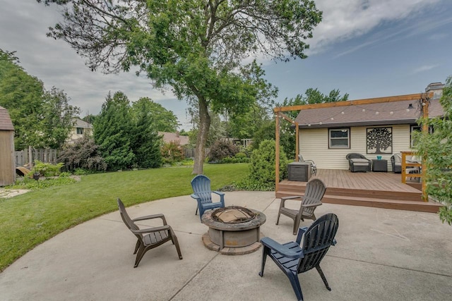 1801 N Mc Intosh Dr, Appleton, WI 54914 - view of patio featuring a deck and an outdoor living space with a fire pit
