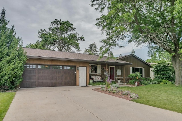 1801 N Mc Intosh Dr, Appleton, WI 54914 - single story home featuring an attached garage, concrete driveway, and a front lawn
