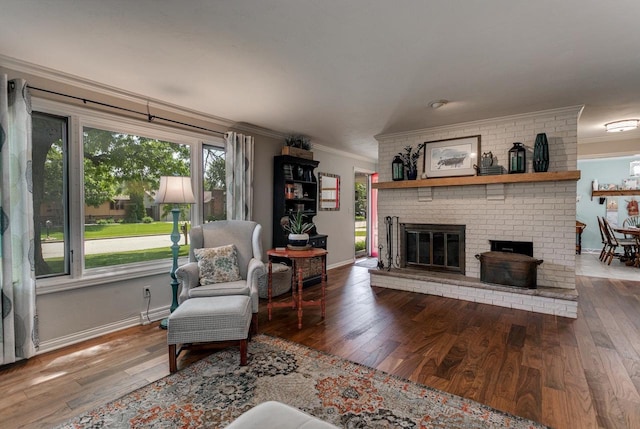 1801 N Mc Intosh Dr, Appleton, WI 54914 - living room with ornamental molding, a fireplace, and wood-type flooring