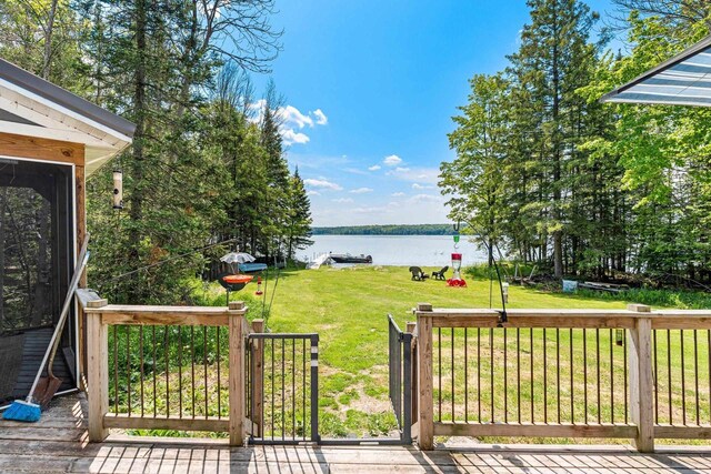 9071 Doemel Ln, Pickerel, WI 54465 - wooden deck with a water view and a yard