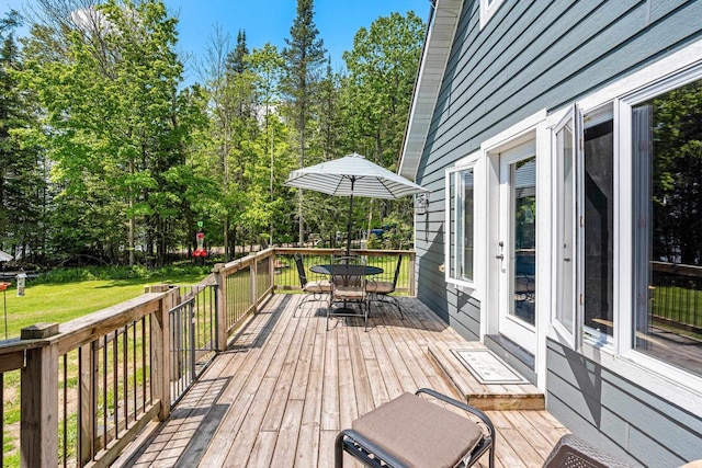 9071 Doemel Ln, Pickerel, WI 54465 - wooden terrace featuring outdoor dining space and a lawn