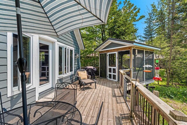 9071 Doemel Ln, Pickerel, WI 54465 - wooden terrace with a sunroom and a grill