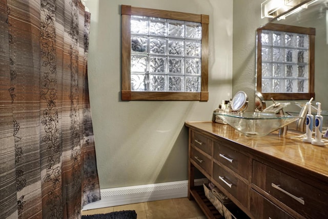 3933 Lovers Ln Unit 3935, 3937, 3939, 39, Slinger, WI 53086 - bathroom with tile patterned flooring and vanity