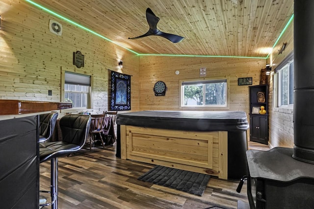 3933 Lovers Ln Unit 3935, 3937, 3939, 39, Slinger, WI 53086 - living room featuring wooden ceiling, lofted ceiling, wood walls, plenty of natural light, and wood finished floors