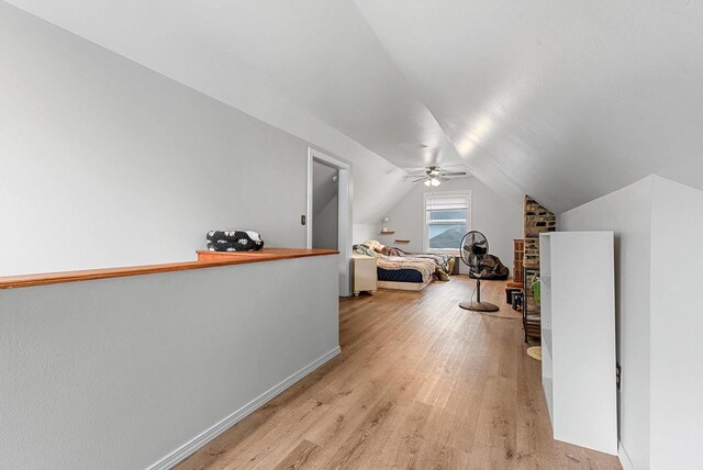 210 S Summit St, Appleton, WI 54914 - bedroom with vaulted ceiling, light wood-style flooring, and ceiling fan