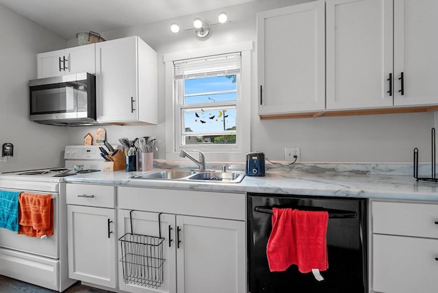210 S Summit St, Appleton, WI 54914 - kitchen featuring stainless steel microwave, black dishwasher, white electric stove, and white cabinetry