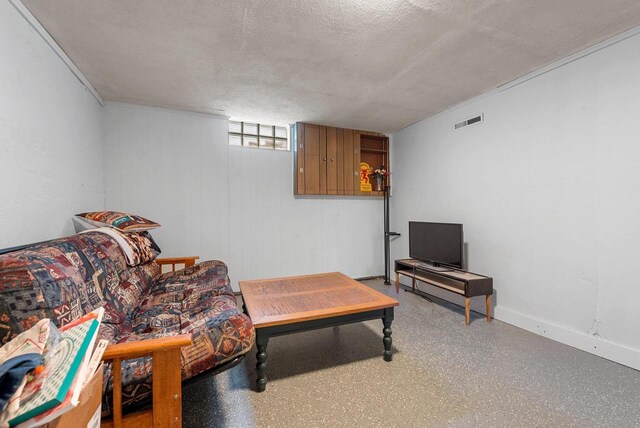 210 S Summit St, Appleton, WI 54914 - living area featuring a textured ceiling and baseboards