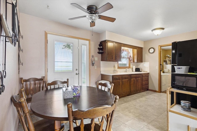 197 Juniper Ave, Brodhead, WI 53520 - dining area with ceiling fan and light tile patterned flooring