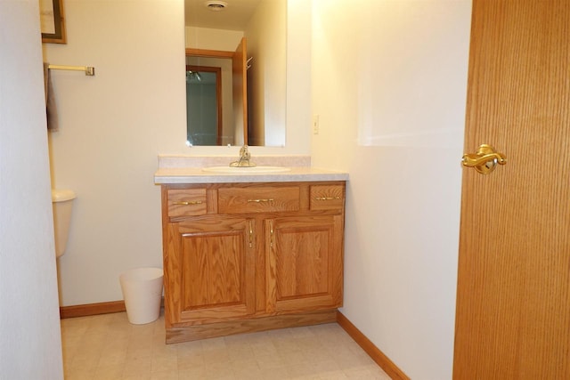 284 White Oak Ave Unit 8, Plover, WI 54467 - bathroom with vanity and baseboards
