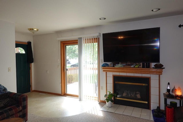 284 White Oak Ave Unit 8, Plover, WI 54467 - living area with a tile fireplace and baseboards