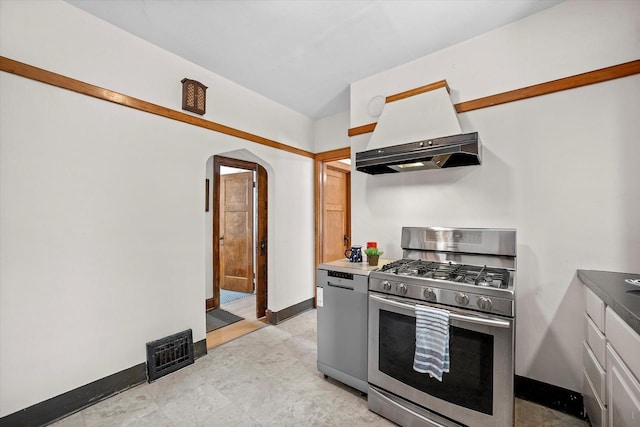 2767 S Herman St, Milwaukee, WI 53207 - kitchen featuring stainless steel appliances, custom range hood, and arched walkways