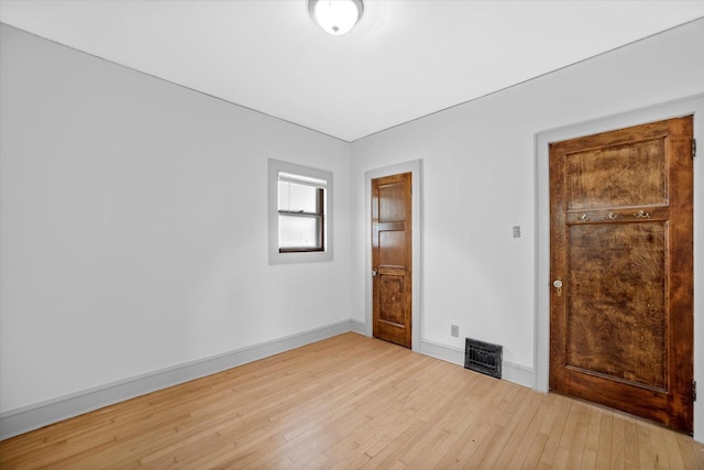 2767 S Herman St, Milwaukee, WI 53207 - unfurnished bedroom with hardwood / wood-style floors and baseboards