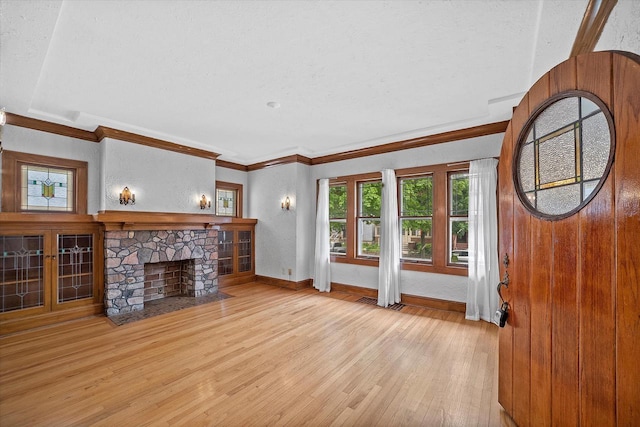 2767 S Herman St, Milwaukee, WI 53207 - unfurnished living room with wood finished floors, plenty of natural light, a fireplace, and crown molding