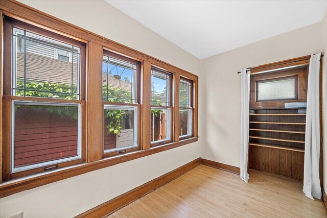 2767 S Herman St, Milwaukee, WI 53207 - unfurnished bedroom with light wood finished floors and baseboards