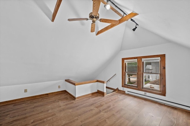2767 S Herman St, Milwaukee, WI 53207 - bonus room with lofted ceiling, a baseboard radiator, wood finished floors, and ceiling fan