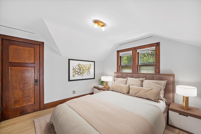 2767 S Herman St, Milwaukee, WI 53207 - bedroom with lofted ceiling and light wood-style flooring