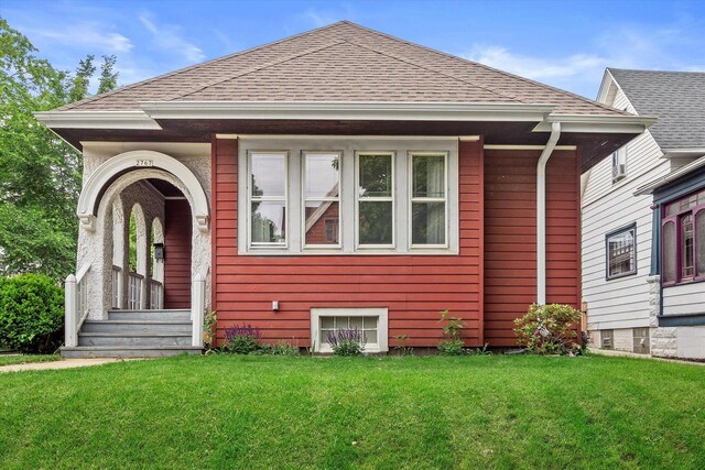 2767 S Herman St, Milwaukee, WI 53207 - view of front of property featuring a shingled roof and a front yard
