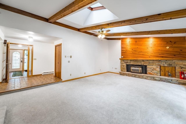 1705 Stark St, Wausau, WI 54403 - unfurnished living room with baseboard heating, a skylight, a stone fireplace, beam ceiling, and carpet floors