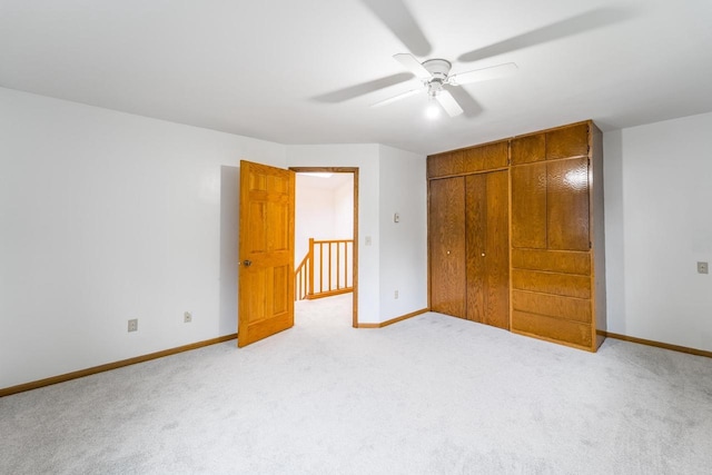 1705 Stark St, Wausau, WI 54403 - unfurnished bedroom with carpet, a closet, and ceiling fan