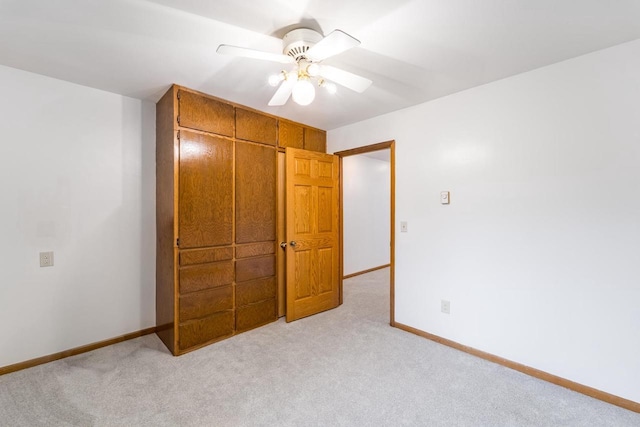 1705 Stark St, Wausau, WI 54403 - unfurnished bedroom featuring light colored carpet, a closet, and ceiling fan