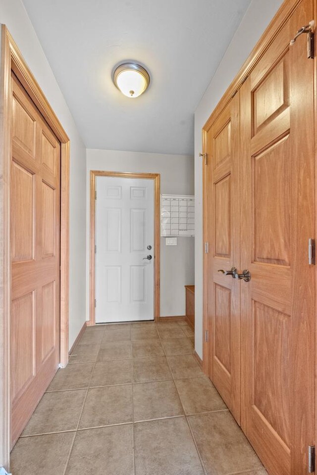 1106 Lake Largo Dr, Green Bay, WI 54311 - foyer entrance featuring baseboards and light tile patterned flooring