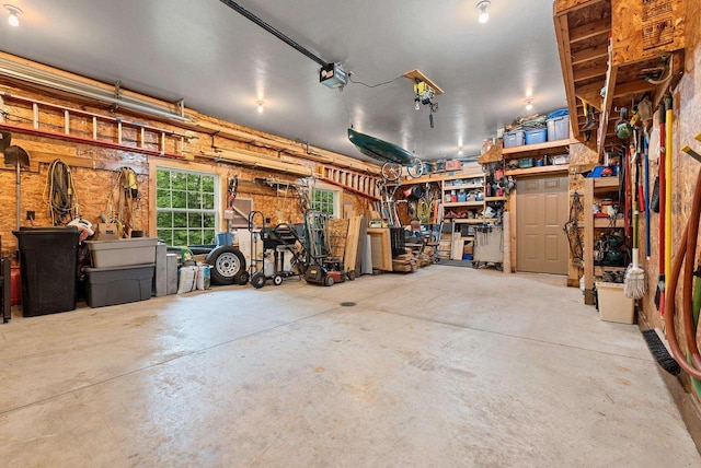 N5730 Parkway Rd, Pound, WI 54161 - garage featuring a garage door opener and a workshop area