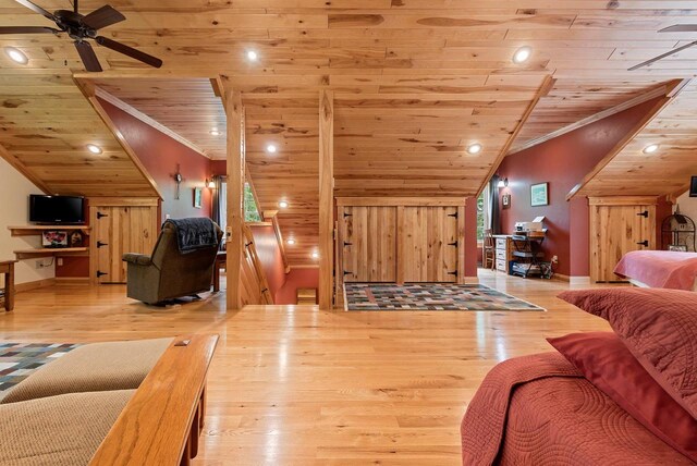 N5730 Parkway Rd, Pound, WI 54161 - living area with wood ceiling, ceiling fan, wood finished floors, lofted ceiling, and crown molding