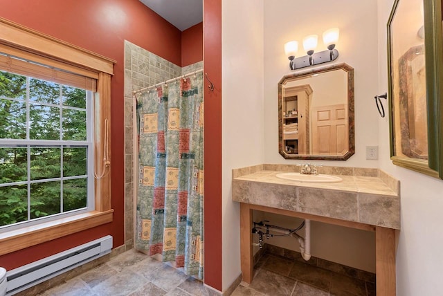 N5730 Parkway Rd, Pound, WI 54161 - bathroom featuring a baseboard radiator and curtained shower
