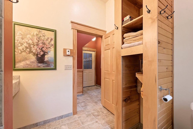 N5730 Parkway Rd, Pound, WI 54161 - hall with baseboards and stone finish floors