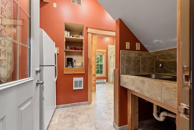 N5730 Parkway Rd, Pound, WI 54161 - bathroom with vaulted ceiling and a baseboard radiator