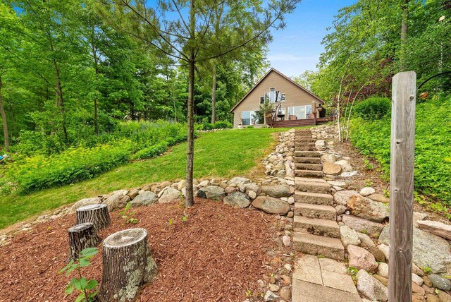 N5730 Parkway Rd, Pound, WI 54161 - view of grassy yard featuring a wooden deck