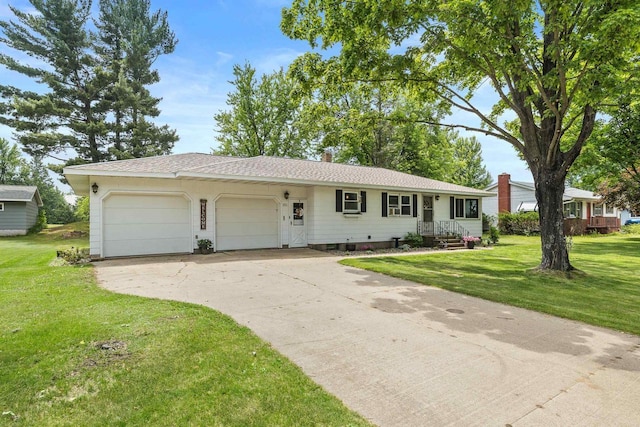 551 Market Ave, Port Edwards, WI 54469 - ranch-style house with a garage, concrete driveway, and a front lawn