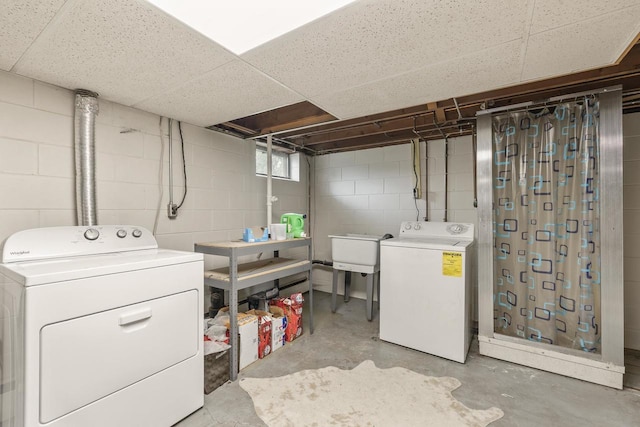 551 Market Ave, Port Edwards, WI 54469 - basement with washing machine and dryer and a drop ceiling