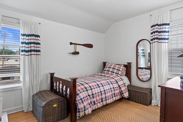 6738 W Monona Pl, West Allis, WI 53219 - bedroom with lofted ceiling and wood finished floors