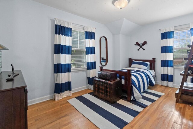 6738 W Monona Pl, West Allis, WI 53219 - bedroom with hardwood / wood-style floors and lofted ceiling