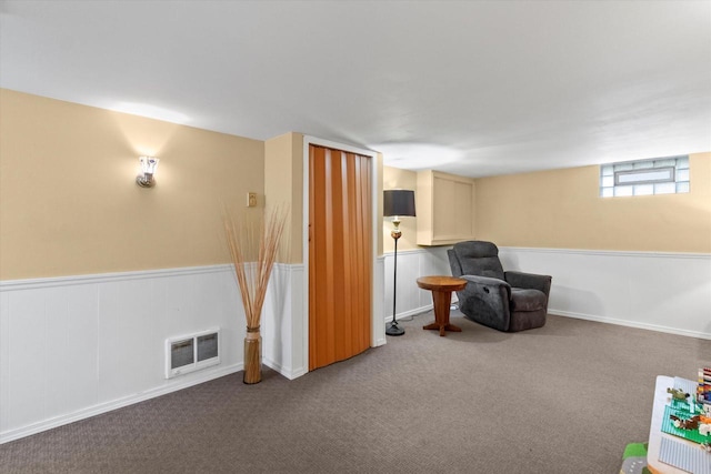 6738 W Monona Pl, West Allis, WI 53219 - living area featuring carpet and a wainscoted wall