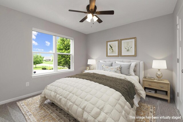 W356N6752 E Stonewood Dr, Oconomowoc, WI 53066 - carpeted bedroom with baseboards and a ceiling fan
