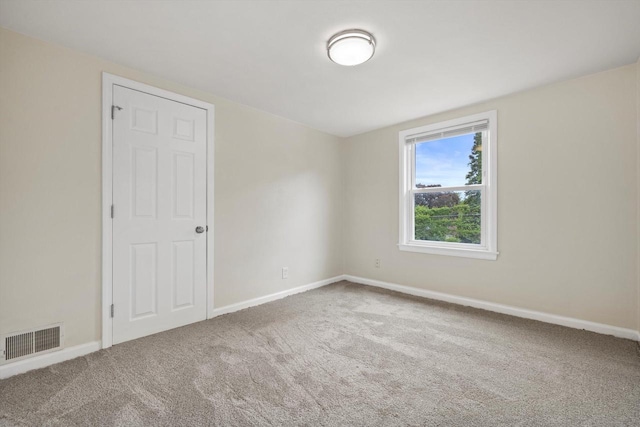 2225 Shoop St, Racine, WI 53404 - unfurnished room featuring carpet floors and baseboards