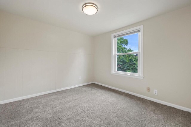 2225 Shoop St, Racine, WI 53404 - unfurnished room featuring carpet and baseboards