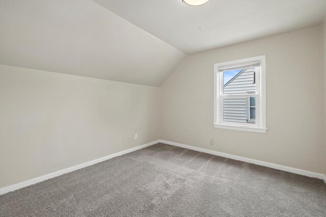 2225 Shoop St, Racine, WI 53404 - bonus room featuring carpet floors and vaulted ceiling
