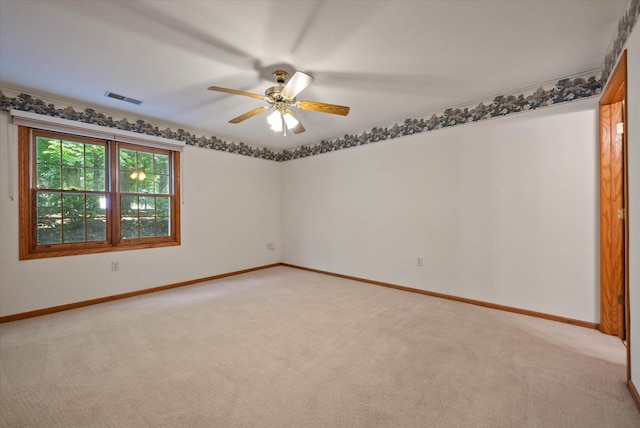 1819 Sumac Ct Unit A, Grafton, WI 53024 - spare room with light carpet and ceiling fan