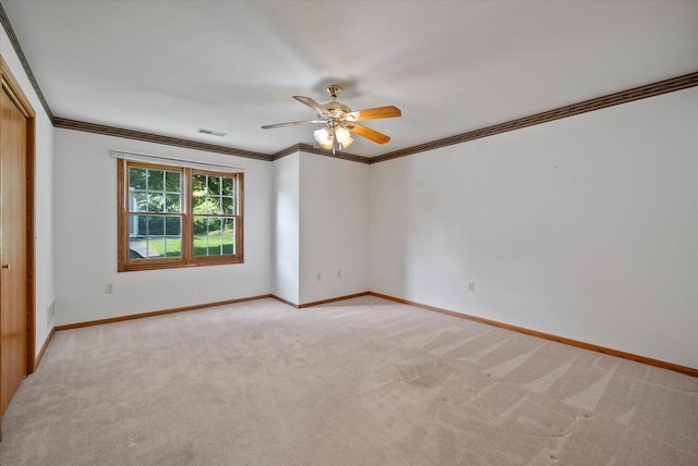 1819 Sumac Ct Unit A, Grafton, WI 53024 - empty room with light colored carpet, crown molding, and ceiling fan
