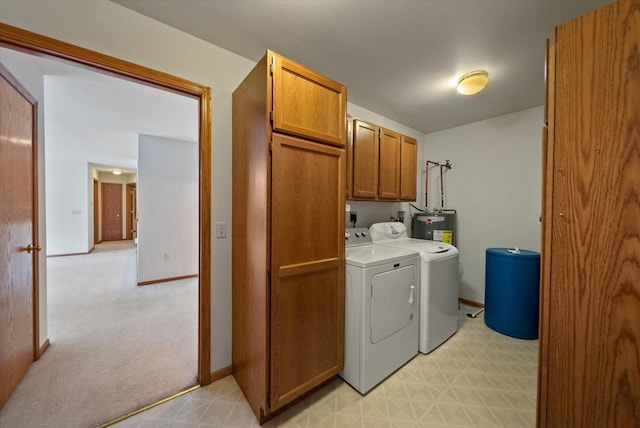 1819 Sumac Ct Unit A, Grafton, WI 53024 - laundry room with cabinet space, separate washer and dryer, electric water heater, light flooring, and light carpet