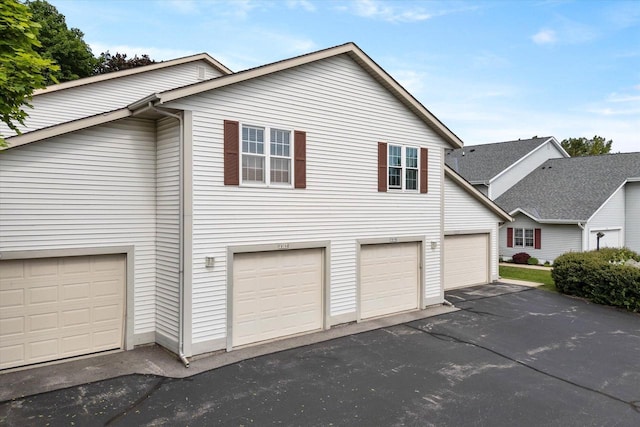1819 Sumac Ct Unit A, Grafton, WI 53024 - view of front of home featuring an attached garage