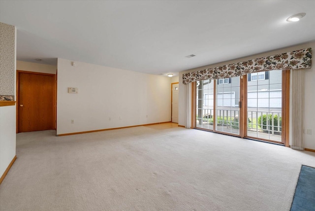 1819 Sumac Ct Unit A, Grafton, WI 53024 - spare room with light colored carpet and baseboards